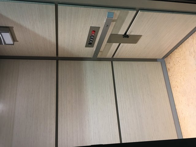 White elevator cab interior
